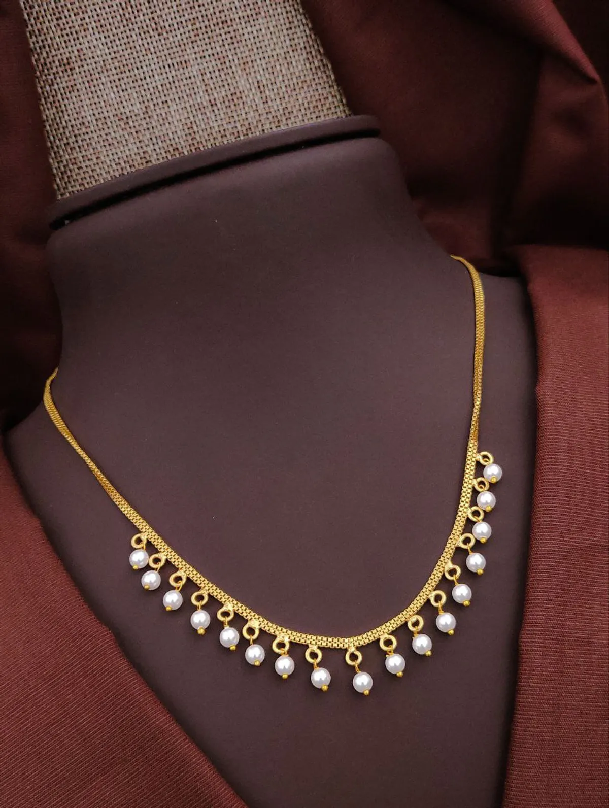 Gold tone pearl drop necklace for women