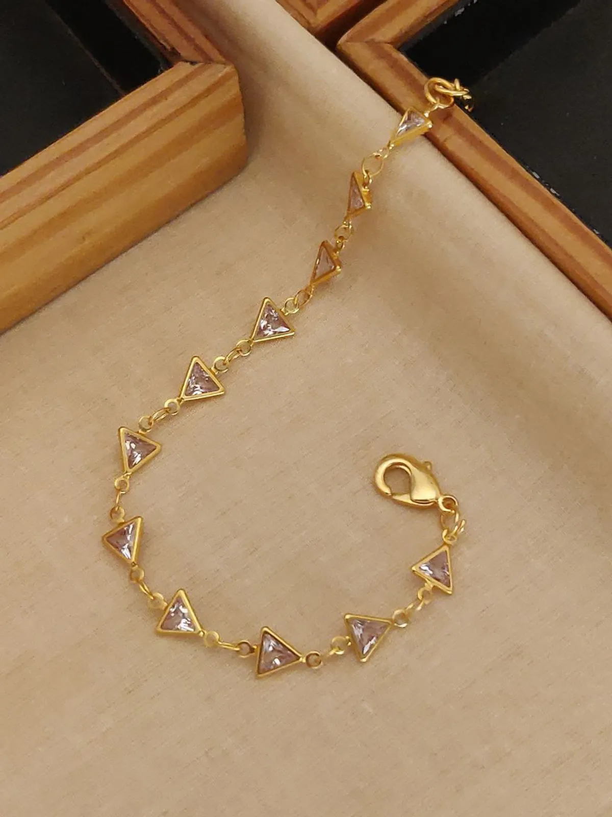 Triangle crystal stone gold bracelet for women